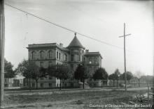 Baynard House with horse drawn carriage in motion